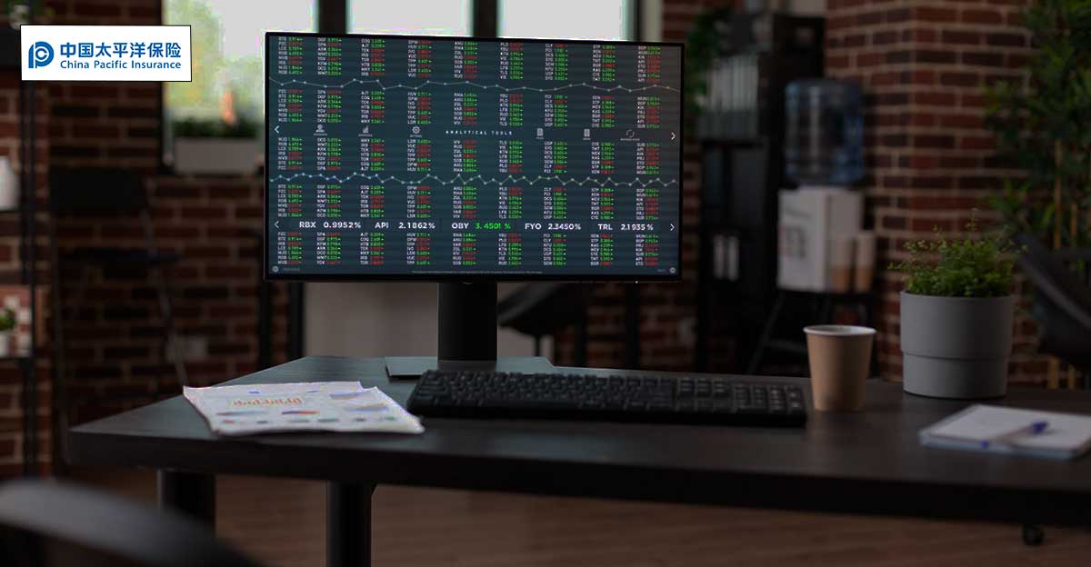 Photo of computer screen with financial data on it. China Pacific Insurance logo in top left corner.