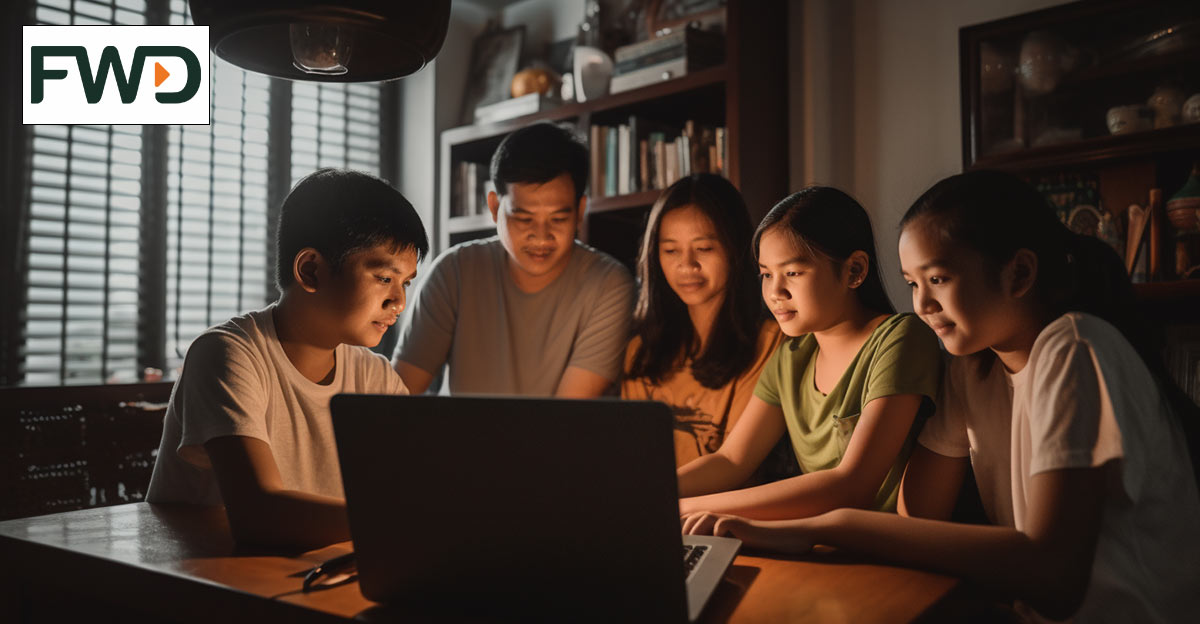 Photo of Filipino family sitting around a computer with glowing screen. FWD logo in top left corner.