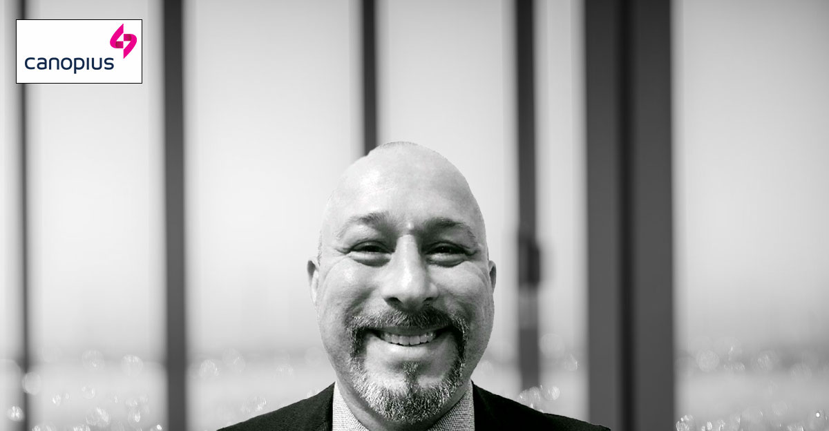 Profile photo of David Hoffman with blurred office background.