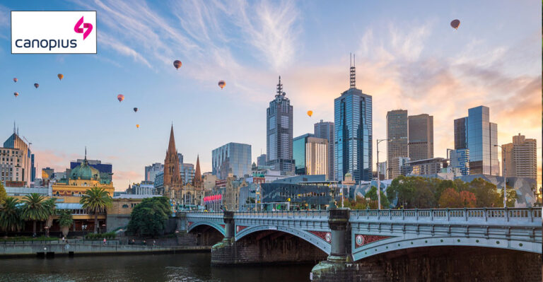 Photo of Melbourne with hot air balloons in the sky. Canopius logo in top left corner.