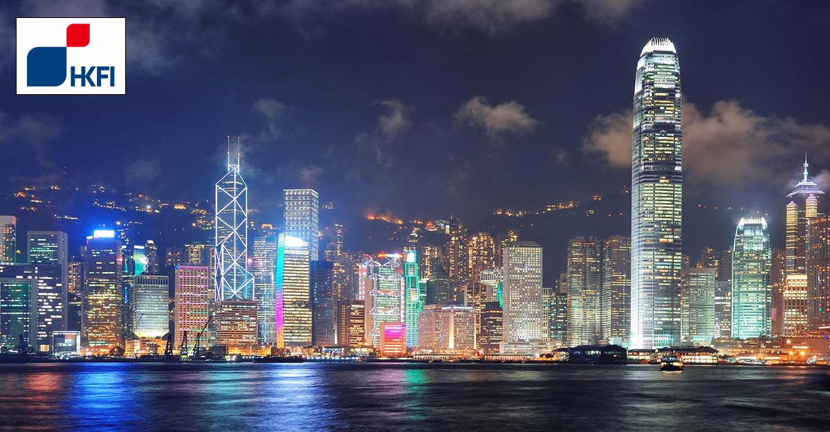 Photo of Hong Kong harbour at night time. HKFI logo in top left corner.