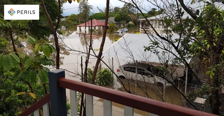 Photo of house and cars flooded in Australia.