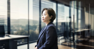 Profile photo of Young-ran Kim with blurred office background.