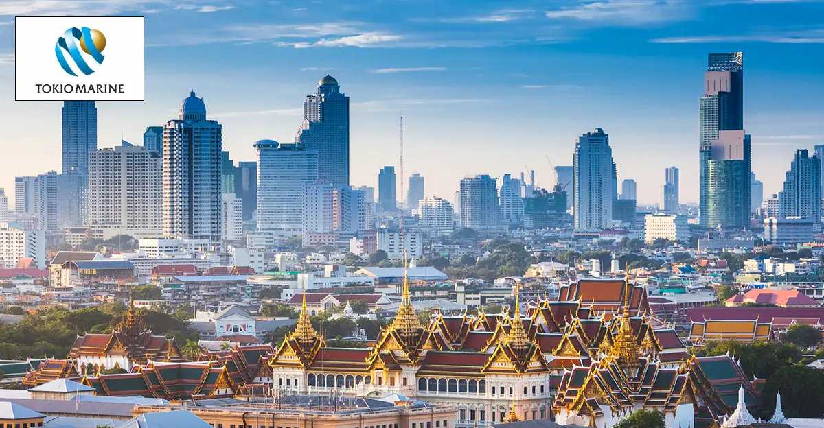 Photo of Thailand city. Logo of Tokio Marine in top left corner.