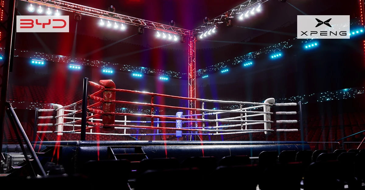 A photo of a boxing ring. BYD and XPENG logos in top left corner.