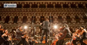 A photo of Musicians playing classical instruments. Howden logo in top left corner.