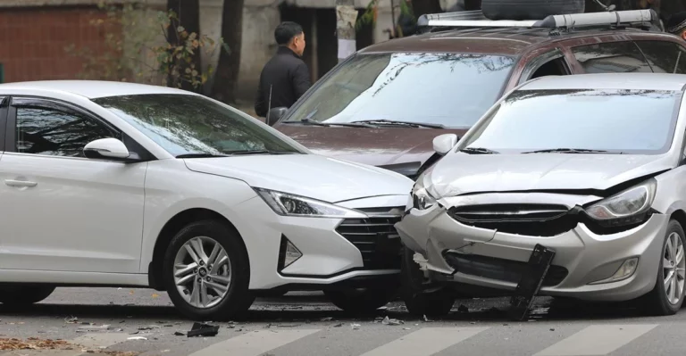 A photo of two motor vehicles in an accident.