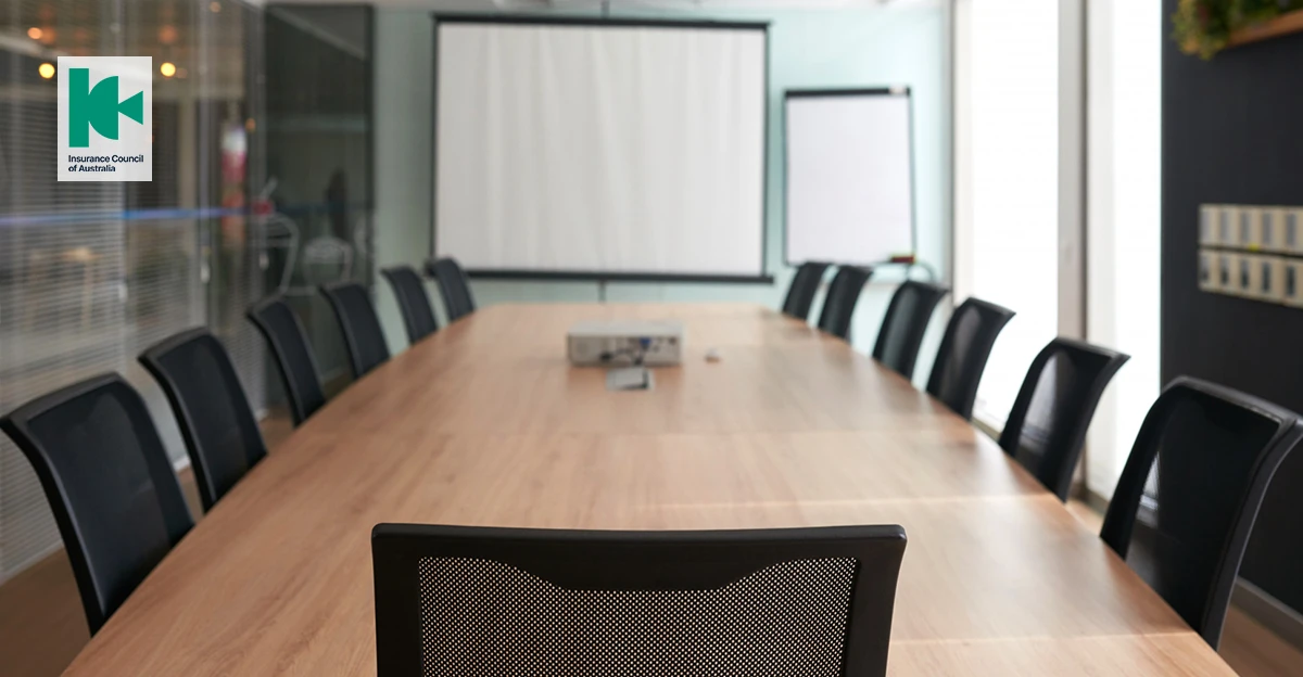 A photo of a boardroom. Insurance Council of Australia logo in top left corner.