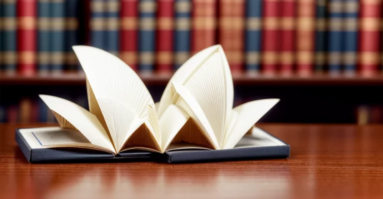 Sydney opera house on a book in front of a library.