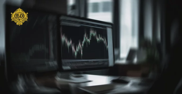 A blurry image of a computer screen with a stock chart on it.