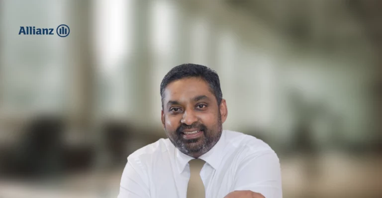 A man wearing a white shirt and tie.