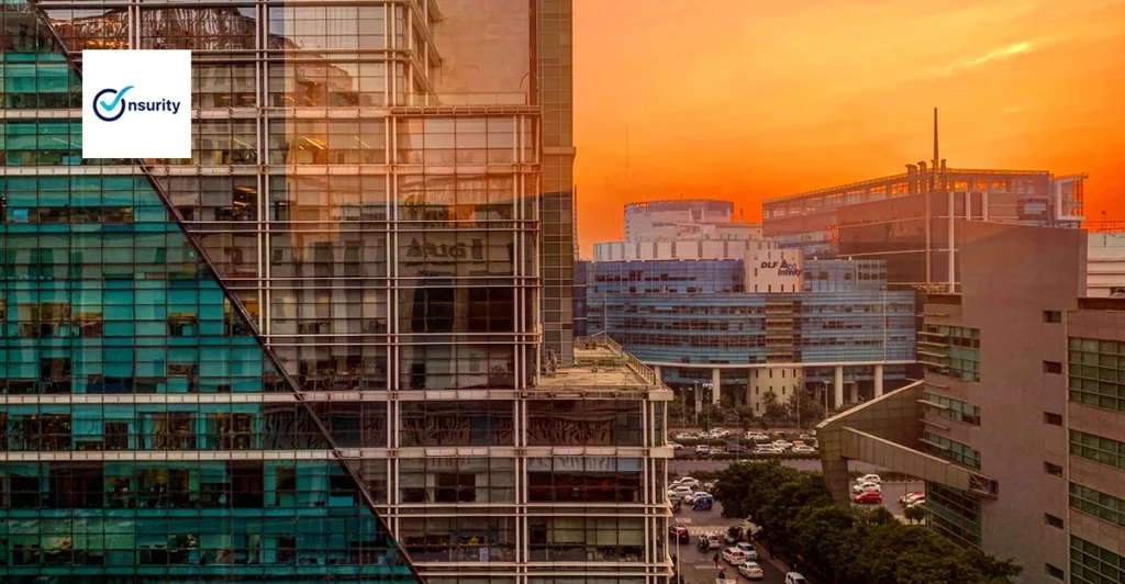 An image of a city at sunset with a building in the background.