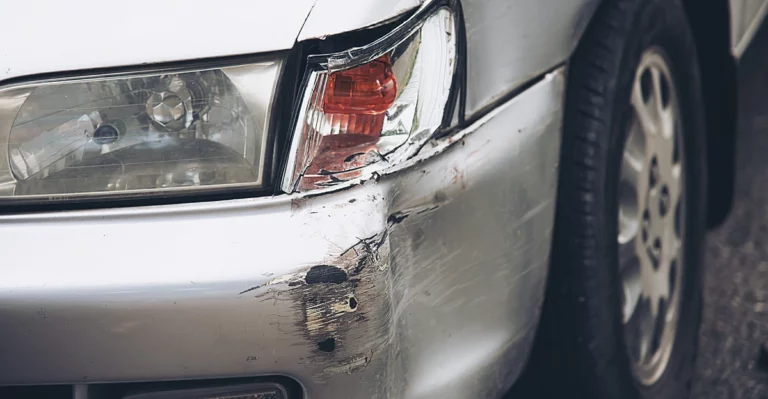 An image of a car with a damaged front end.