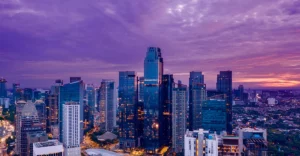 The skyline of singapore at dusk.