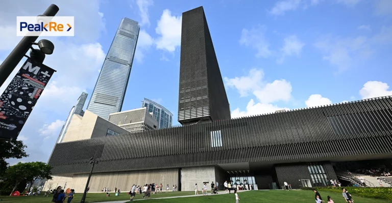 A building with a tall building in front of it.