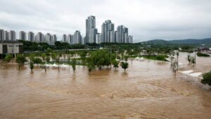 File photo: Seocho-gu, Seoul, South Korea - August 6, 2020: Flood of Han River at Banpo Han River Park against high rise apartments