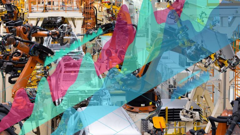 High-tech manufacturing cell with multiple robotic arms assembling a large component inside an industrial facility.