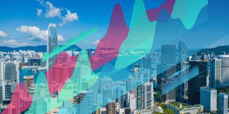 City skyline with overlaid colorful financial charts, illustrating market trends and data visualization.