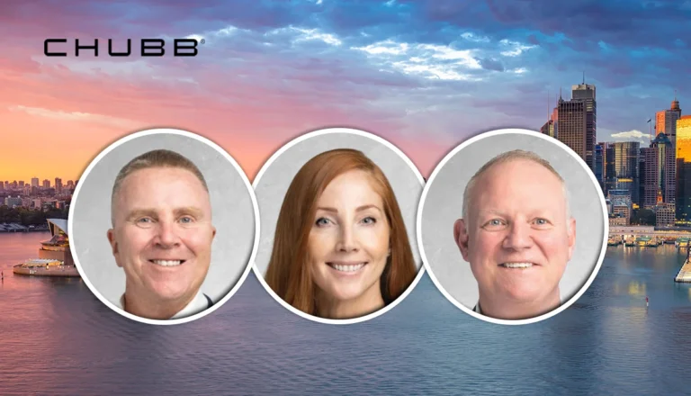CHUBB logo above three circular headshots of smiling team members over a sunset harbor skyline backdrop.