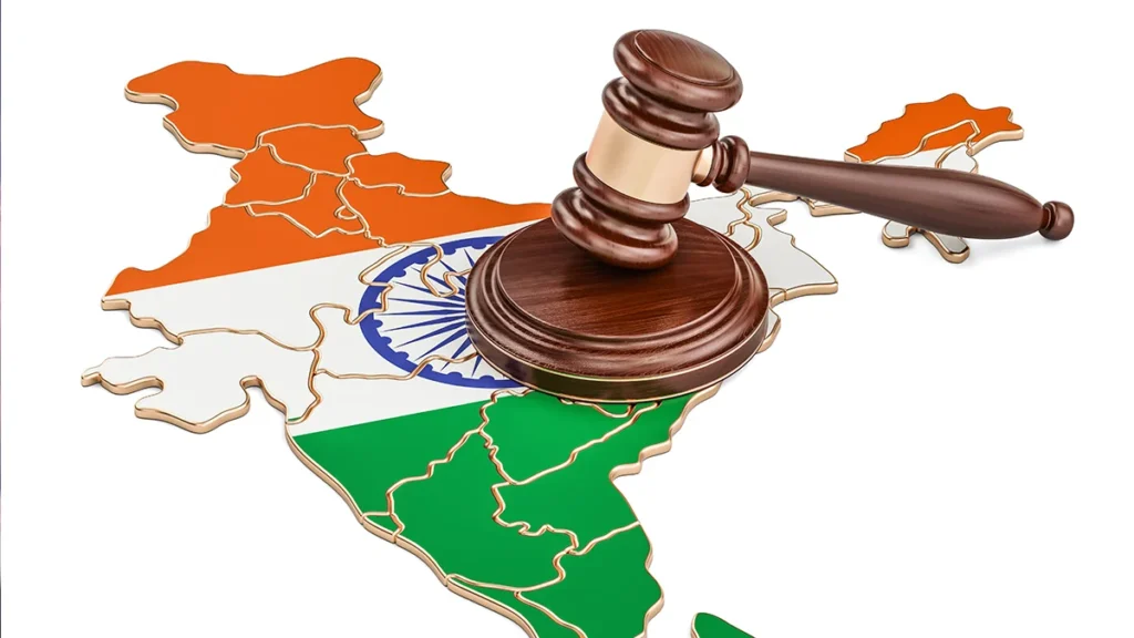 Judicial gavel over a map of India colored with the Indian flag, symbolizing law in India.