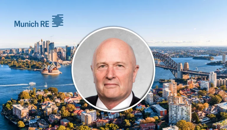Aerial view of Sydney harbour with the Opera House and Harbour Bridge; circular portrait of a bald man in a suit overlaid; Munich Re logo top left.