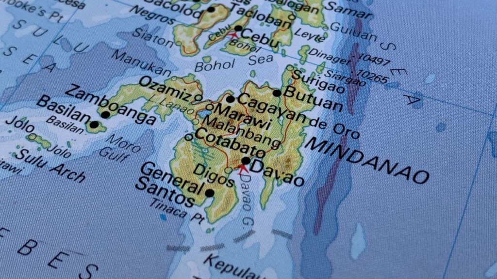 Map of Mindanao, Philippines, labeling major cities such as Davao, General Santos, Cotabato, Zamboanga, Butuan and Surigao.
