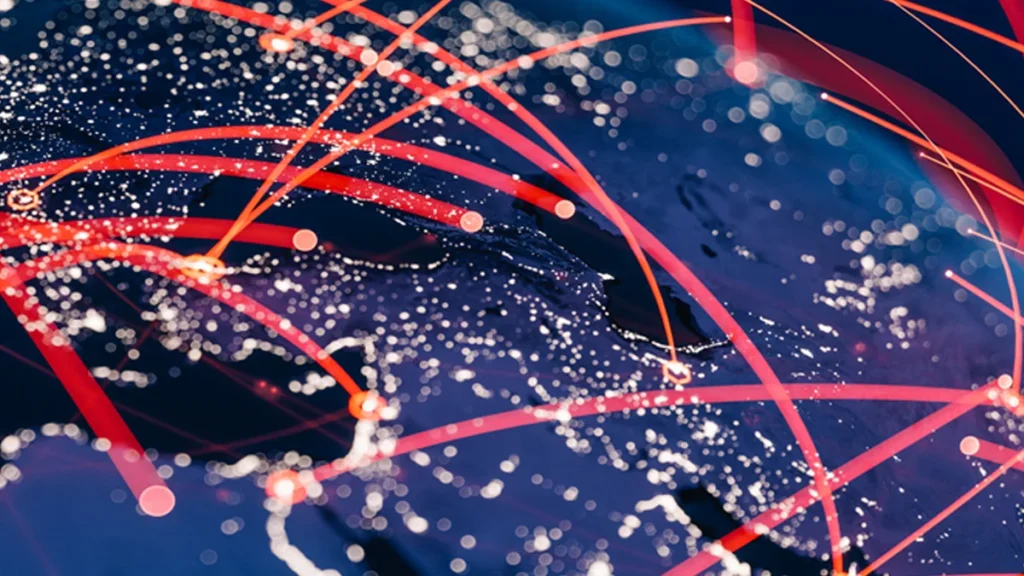 Global map at night with red connectivity lines and glowing nodes illustrating worldwide data networks.