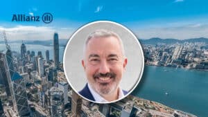 Allianz banner with a city skyline and a circular portrait of a smiling man in a suit.
