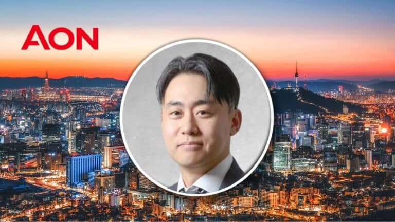 AON logo with a sunset city skyline and a circular portrait of a businessman in the foreground.
