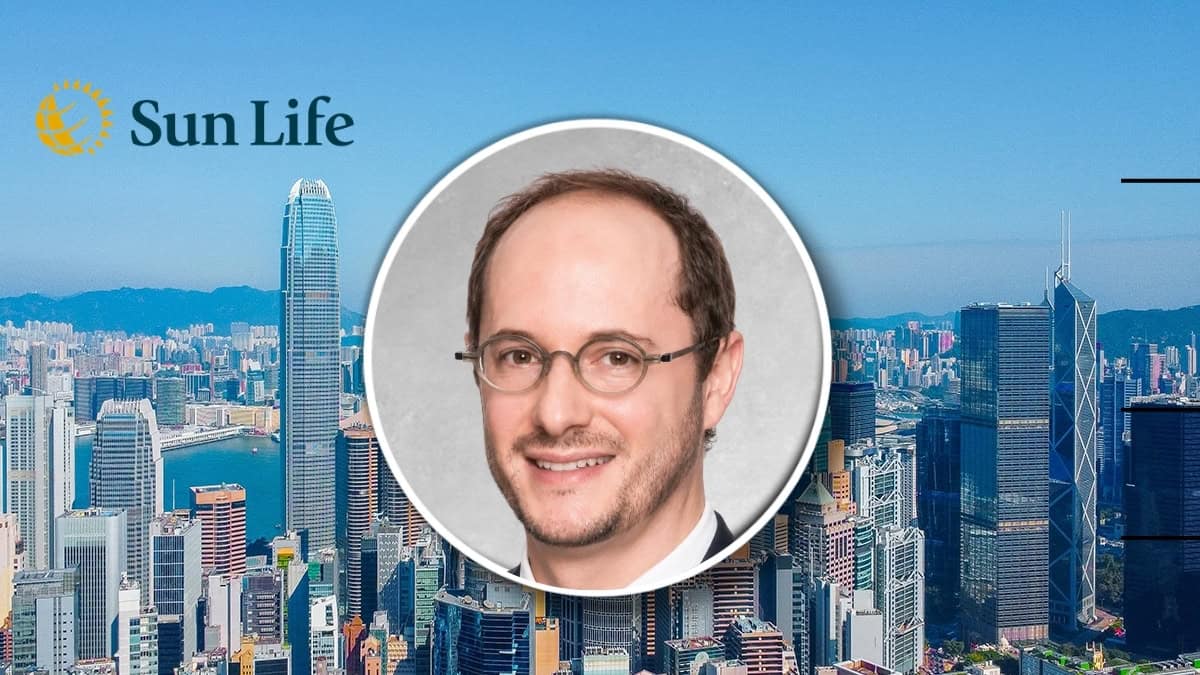 Sun Life banner with a city skyline and a circular portrait of a smiling man in glasses at center.