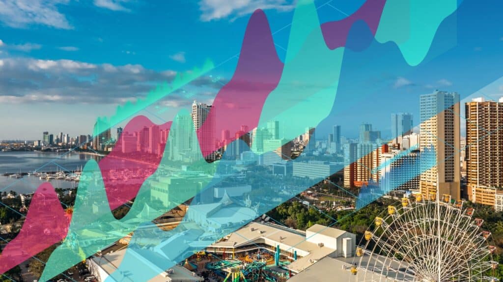 City skyline with financial graphs overlay, reflecting economic growth and market analysis.