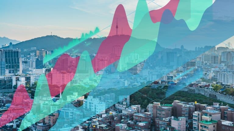 Financial graph over Seoul cityscape after Fortegra acquisition by DB Insurance.