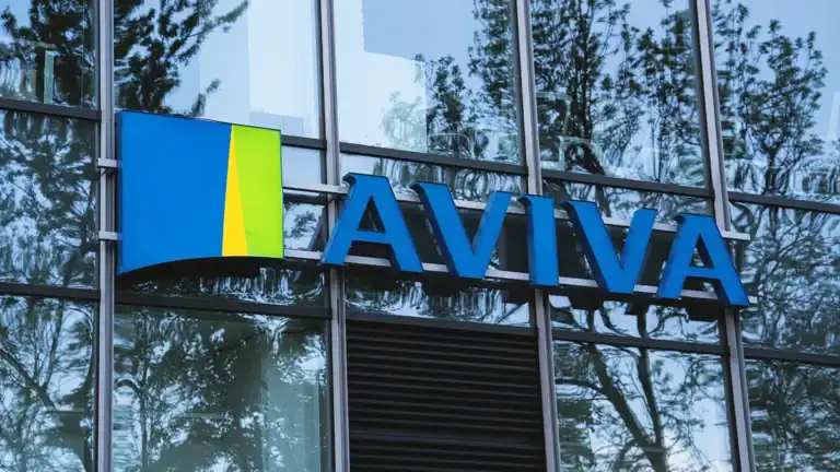 Aviva logo on a glass office building with blue lettering and a blue-yellow icon panel