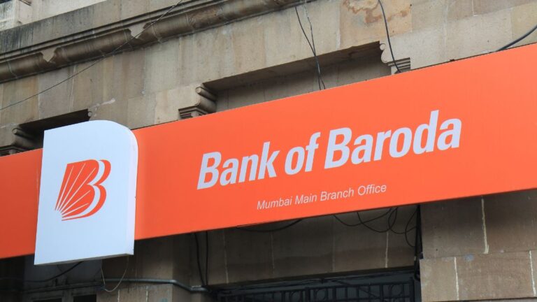 Orange Bank of Baroda sign with white logo and the text 'Bank of Baroda' and 'Mumbai Main Branch Office'.