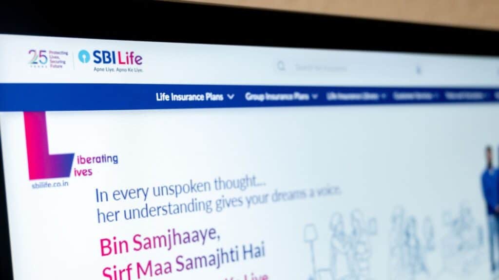 SBI Life insurance homepage hero with the slogan 'In every unspoken thought...' and a pink Hindi line 'Bin Samjhaaye, Sirf Maa Samajhti Hai' beside the SBI Life logo.