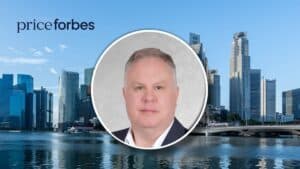 Price Forbes Singapore hires Craig McCoig-Lees to lead casualty MGA expansion Executive portrait of a man in a circular frame overlaying a city skyline with the Price Forbes logo on top left