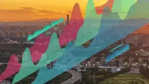 City skyline at sunset overlaid with colorful translucent line and area charts representing data trends and growth.