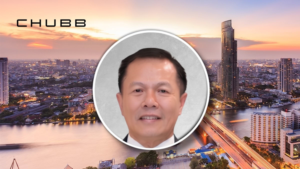 Sahapol Polpathapee, Deputy Country President of Chubb Life Thailand, in front of Bangkok skyline.