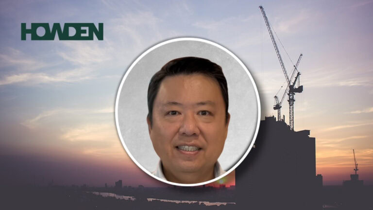 Akihisa Hirata, new leader of Japan construction business at Howden, in front of construction site.