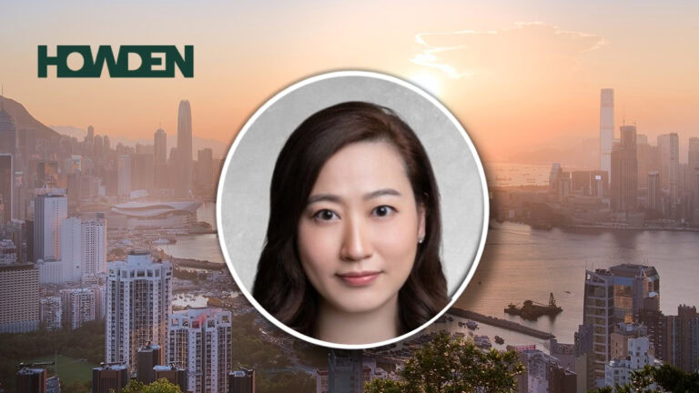 Portrait of a woman (headshot) centered over a Hong Kong skyline at sunset with a Howden logo in the top-left corner, suggesting a company profile feature.