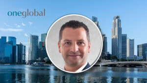 Oneglobal taps Fabien Goutoulli as Singapore CEO OneGlobal banner with city skyline and a round headshot of a smiling man in the center.