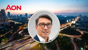 Stephen, Indonesia CEO, appointed by Aon, in front of Jakarta skyline.