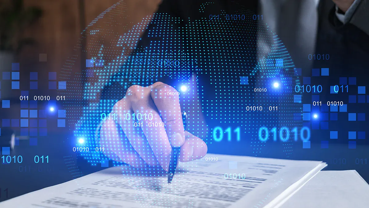 Businessman signing document with digital data overlay, related to cyber security and consultancy.
