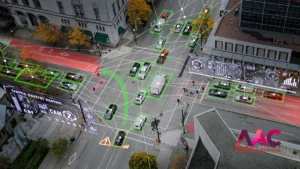 Aerial view of a city street with cars highlighted by green boxes and data overlays showing a smart traffic control system (MAC 2026 Singapore).