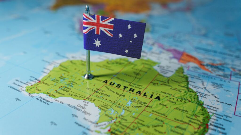Australian flag on a map of Australia, related to industry and geography.