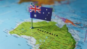 Australian flag on a map of Australia, related to industry and geography.