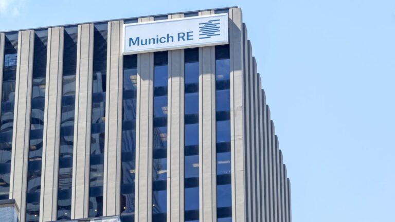 Munich Re office building in Germany with logo visible on top.