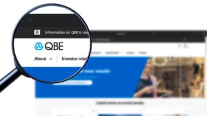 Magnified view of QBE website header with logo and 'About' and 'Investor relations' navigation links.