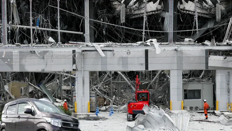 Damaged building and debris after earthquake in Kumamoto, Japan.