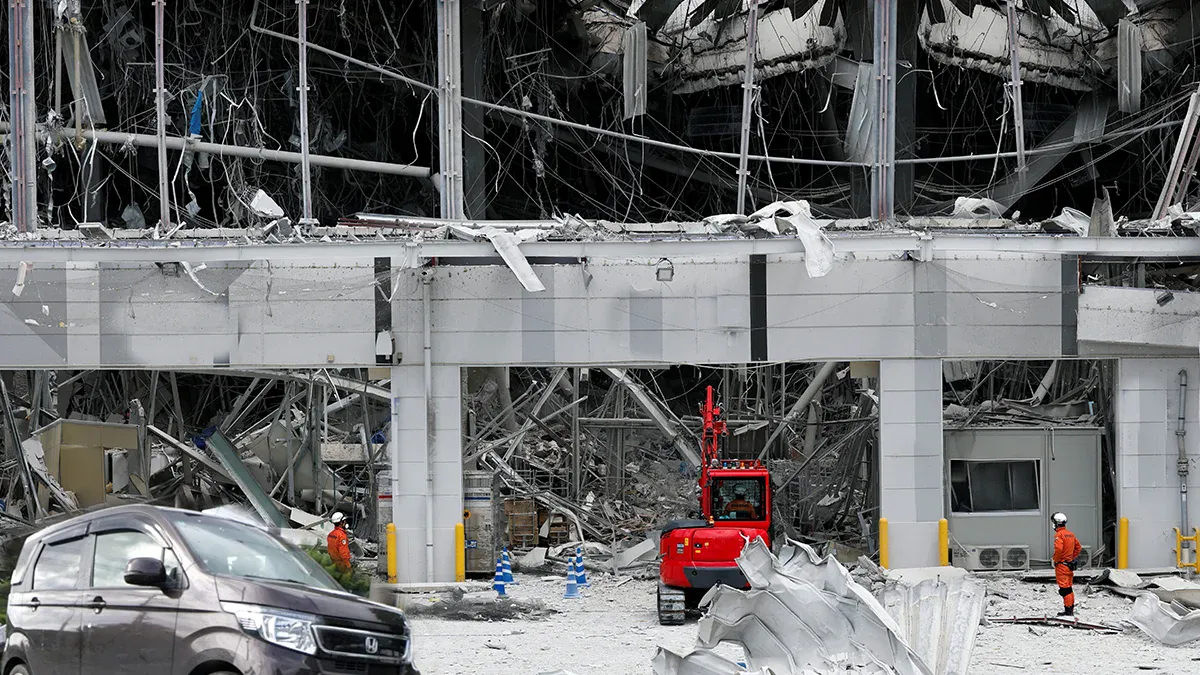 Damaged building and debris after earthquake in Kumamoto, Japan.